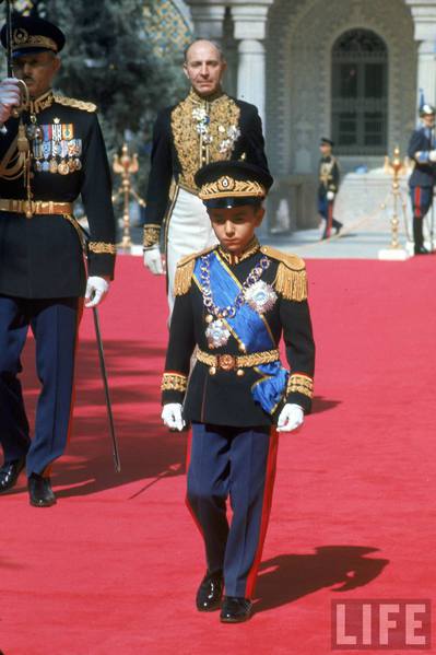 Emperor Napoleon II walking in a formal, decorated military-esque uniform
